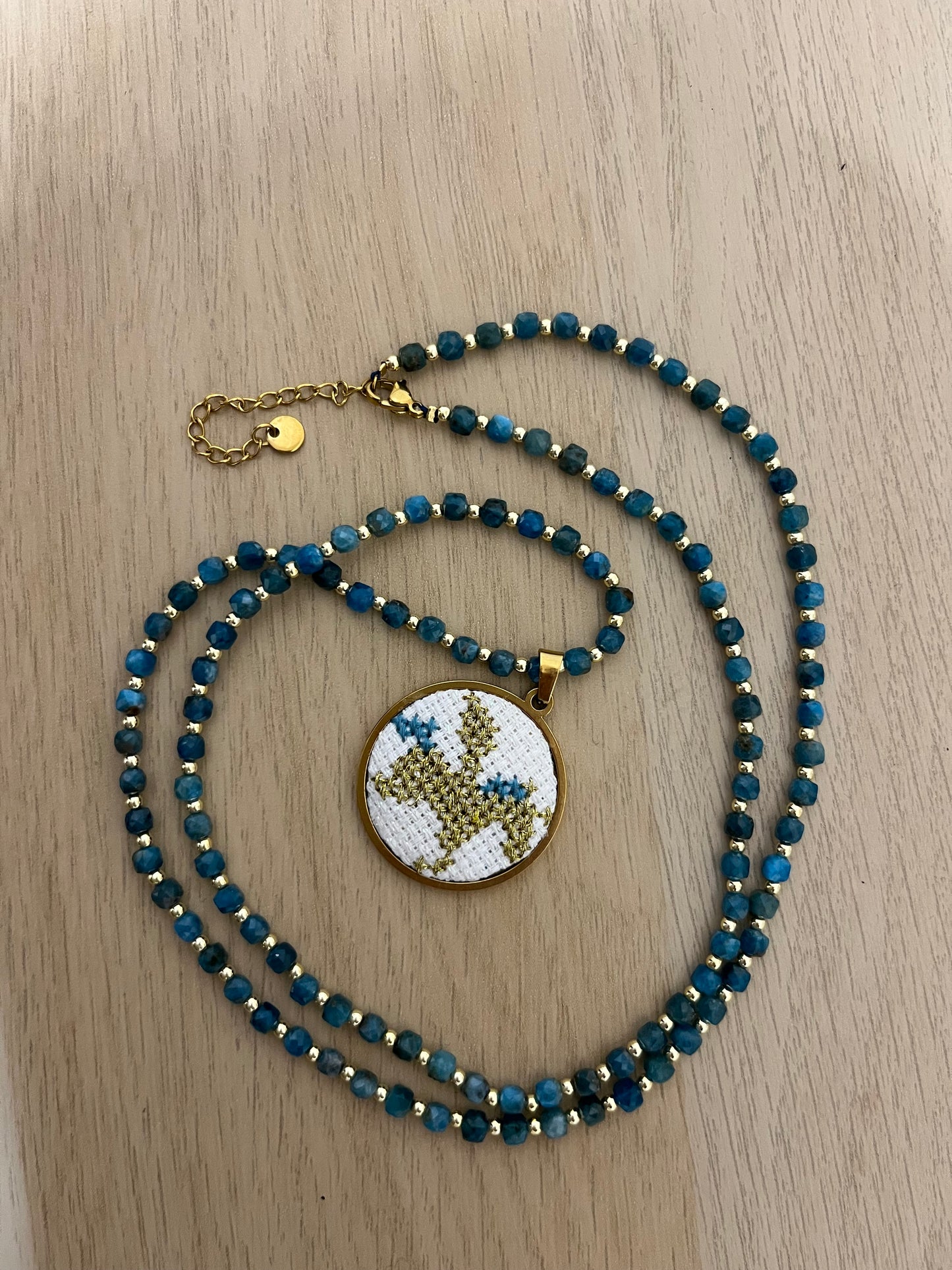 Hand embroidered cross stitch pendant - ‘pegasus’ and apatite necklace