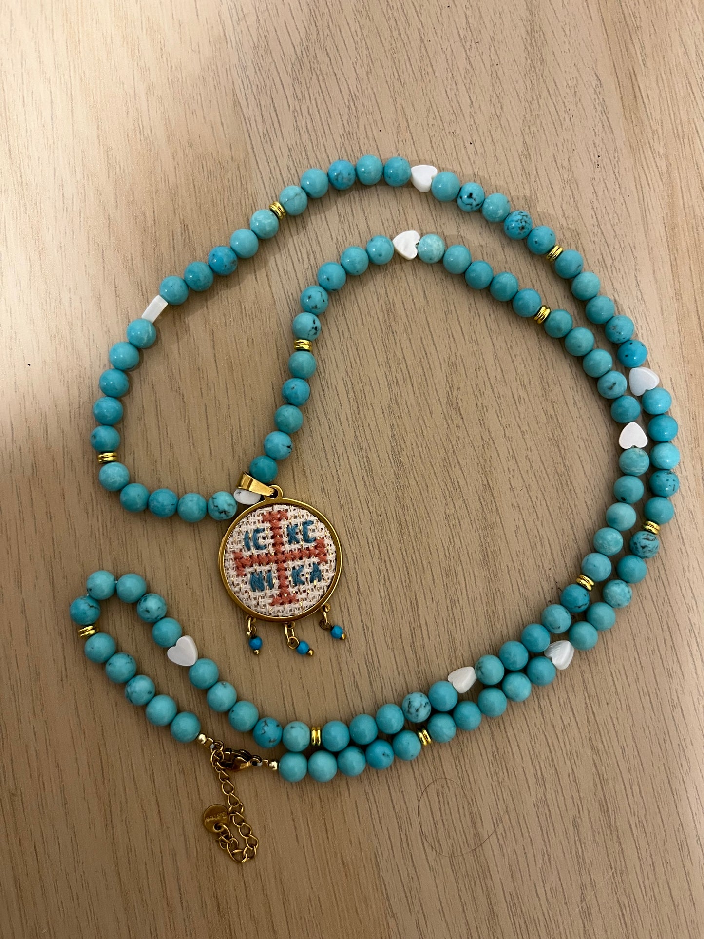 Hand embroidered cross stitch pendant and turquoise beaded necklace - decorative cross IC XC NIKA.