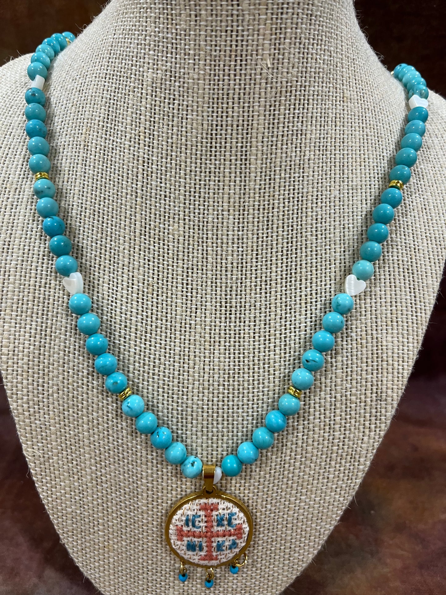 Hand embroidered cross stitch pendant and turquoise beaded necklace - decorative cross IC XC NIKA.