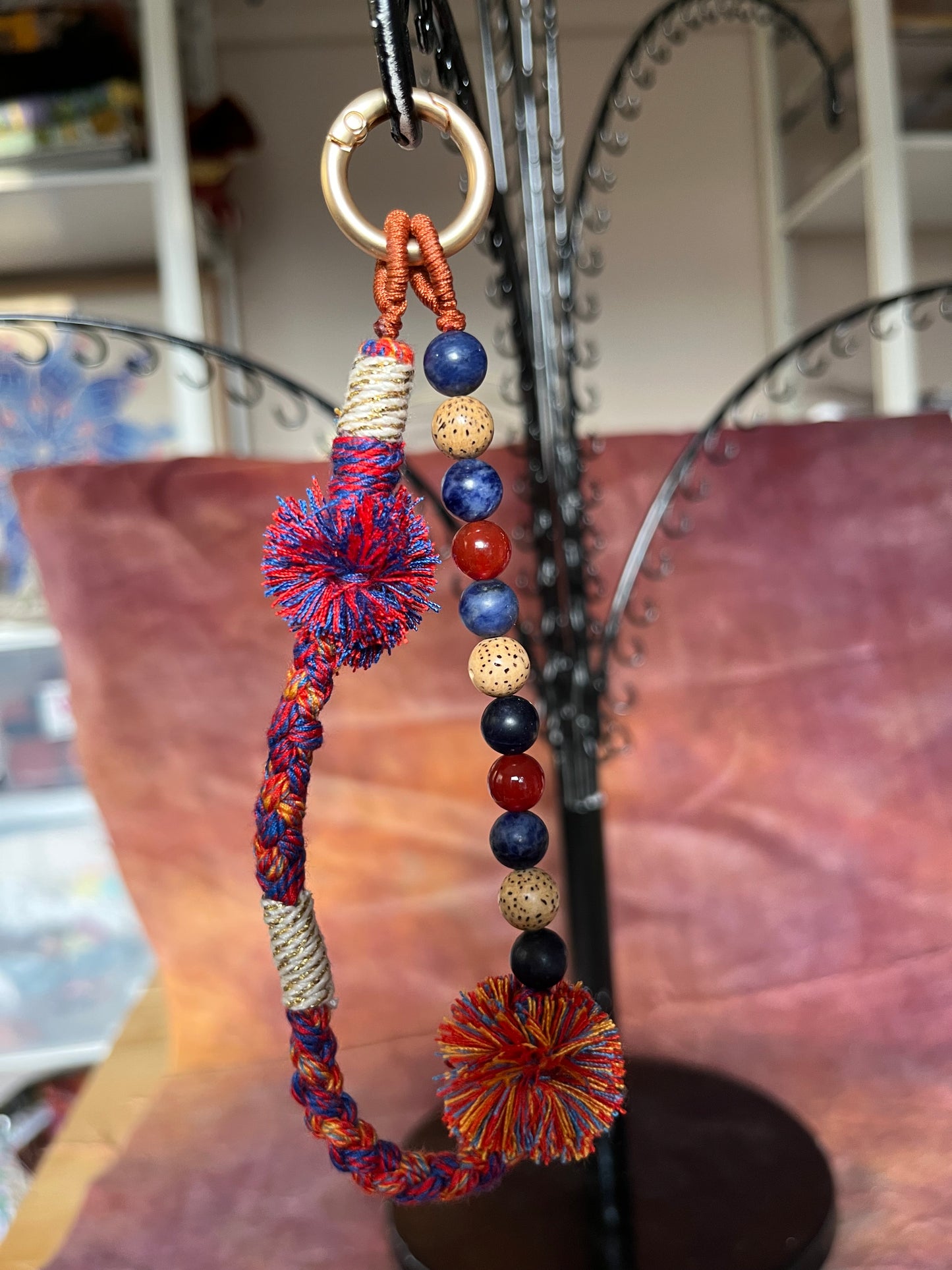 Beaded bag and phone charm with hand embroidered personalisation.