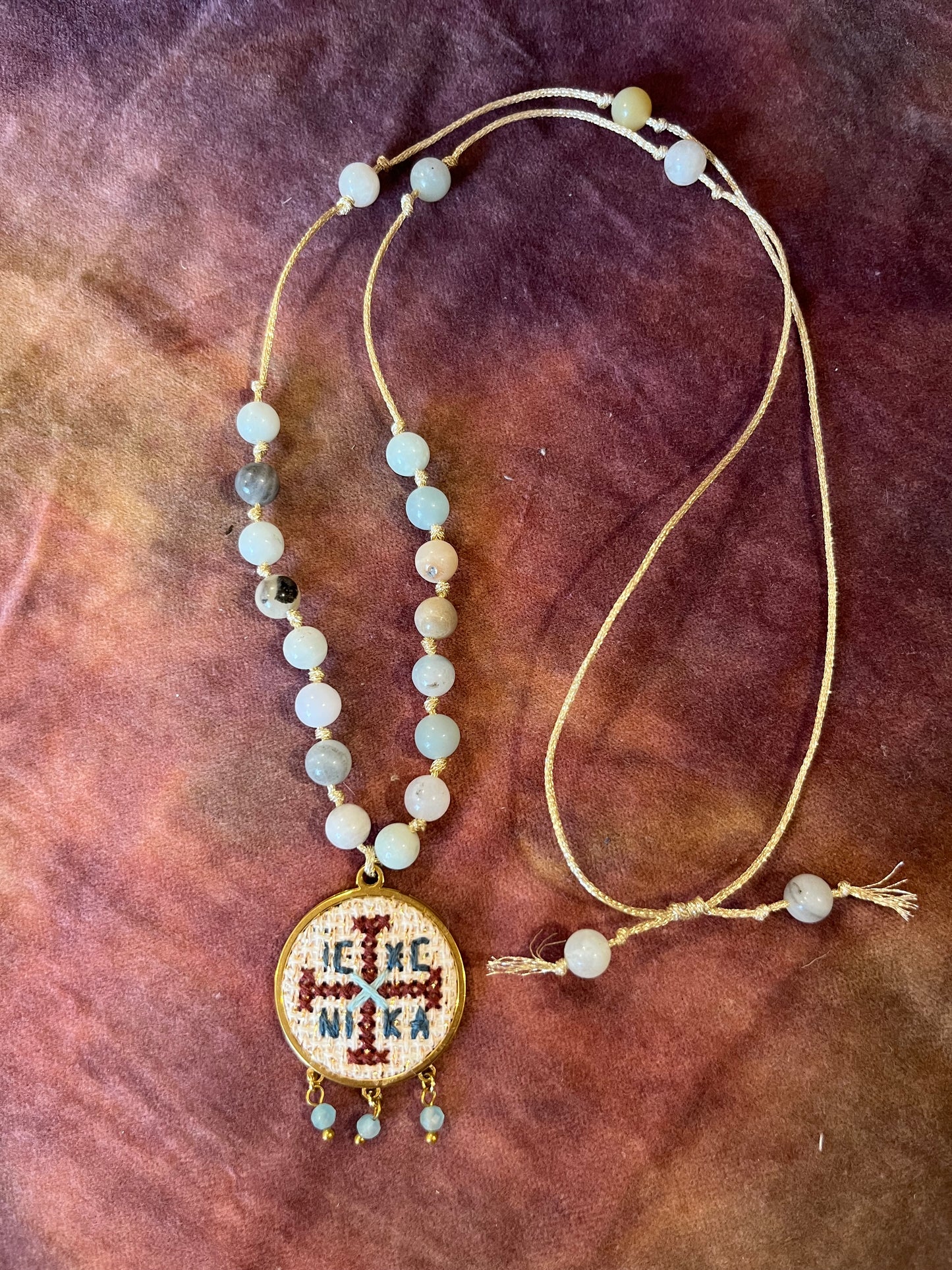 Hand embroidered cross stitch pendant and knotted bead necklace - decorative cross IC XC NIKA.
