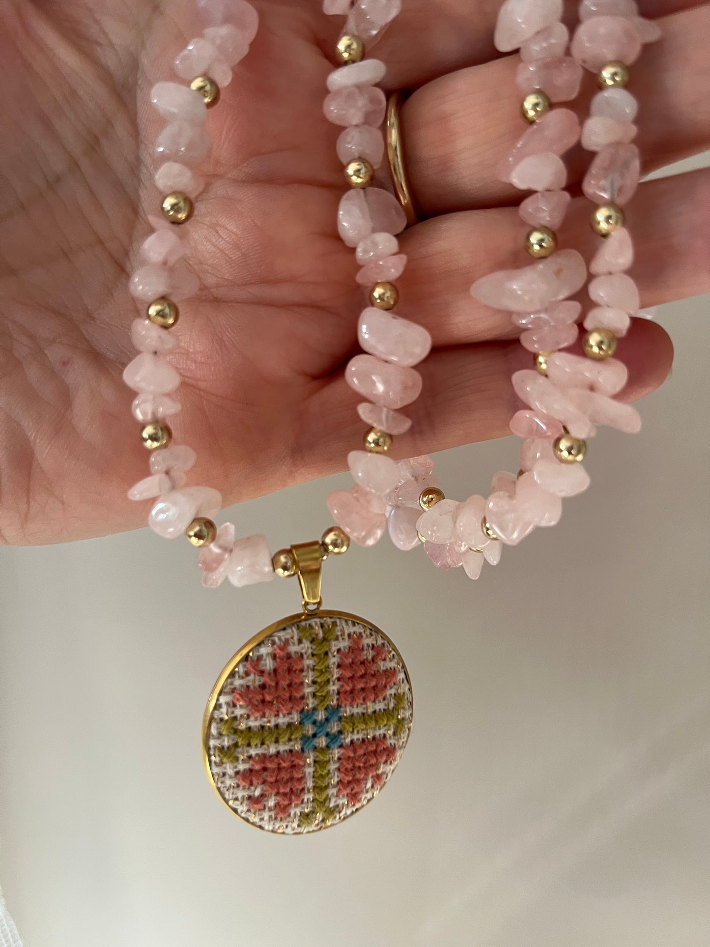 Hand embroidered cross stitch pendant and rose quartz necklace