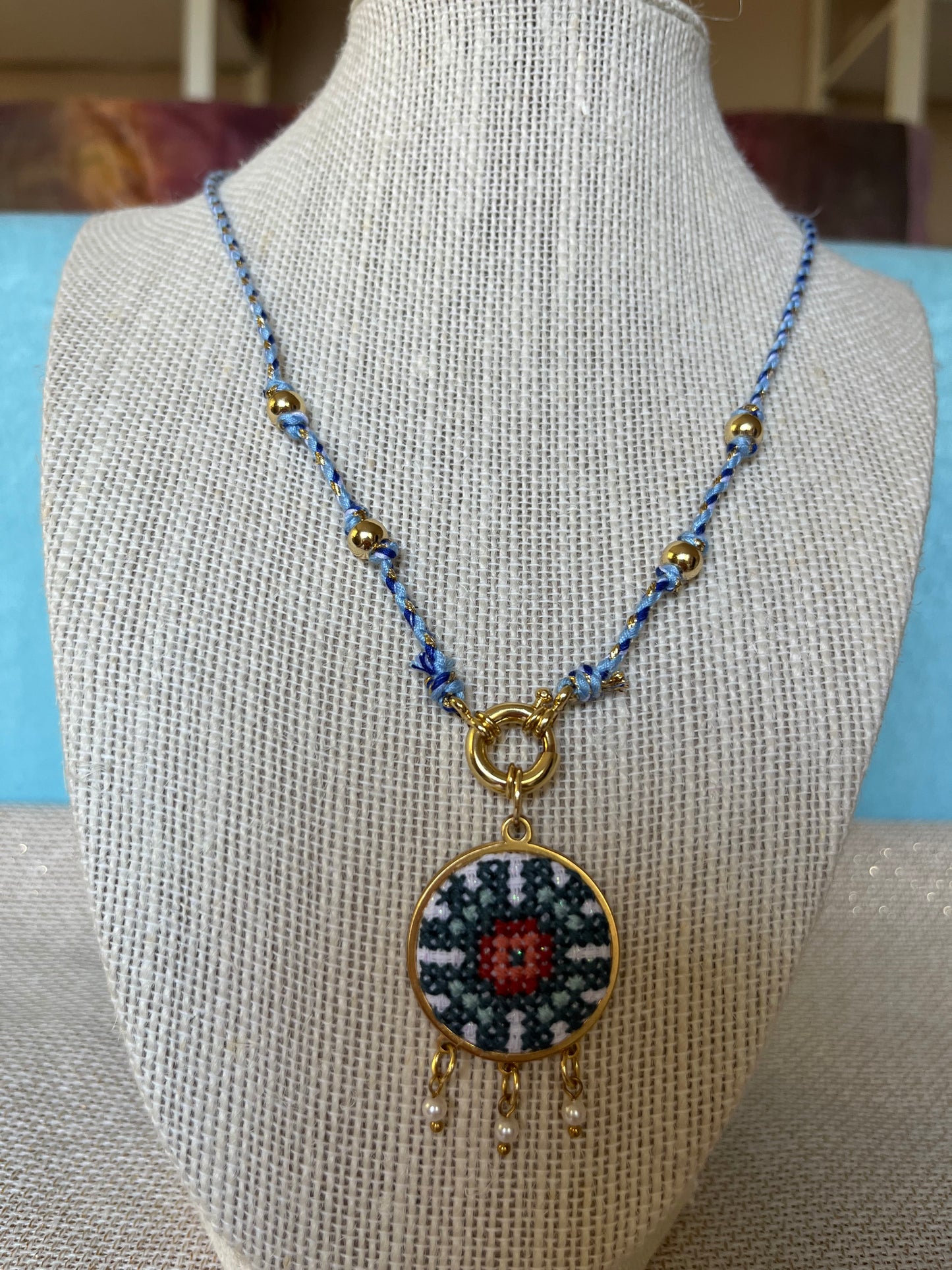 Hand embroidered cross stitch pendant and knotted necklace - geometric flower