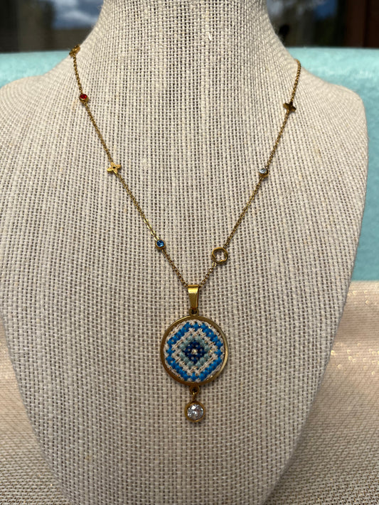 Hand embroidered cross stitch pendant and chain - Mati.