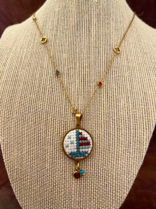 Hand embroidered cross stitch pendant and chain - boat with stars