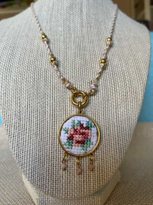 Hand embroidered cross stitch pendant and knotted necklace - rose